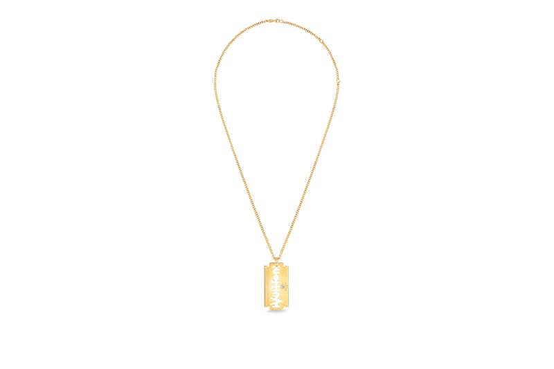 Lv on sale gold pendant