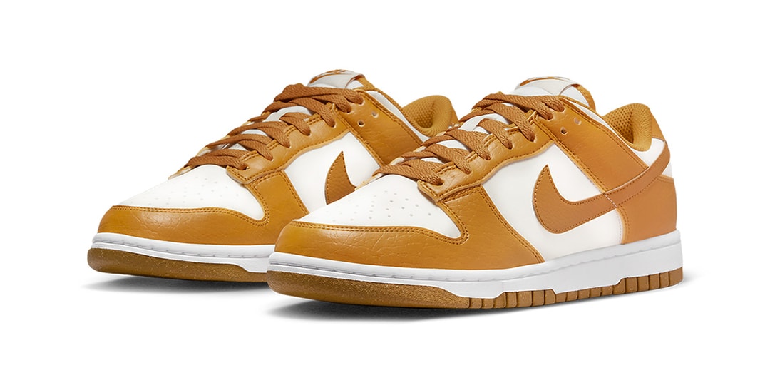 Поверхности Nike Dunk Low Next Nature в золотисто-белой палитре