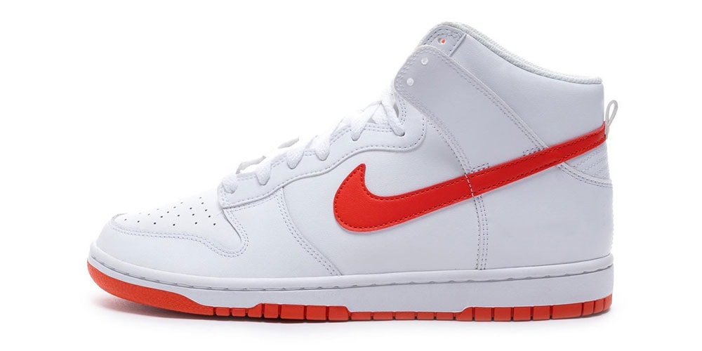 Обратите внимание на неизданные бело-оранжевые кроссовки Nike Dunk High.