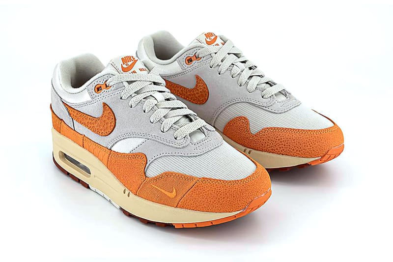 Orange nike air max sales 1