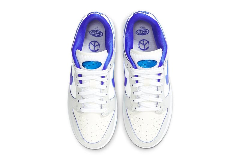 White nikes with blue on sale swoosh