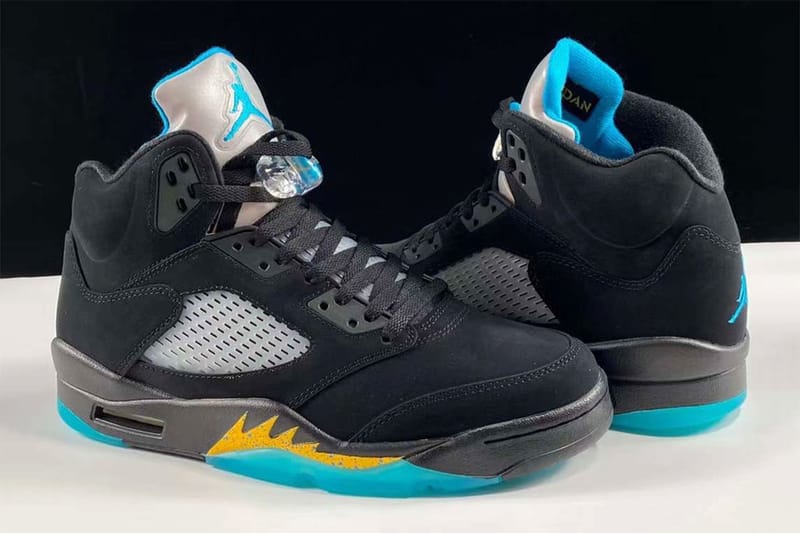 Black and shop yellow jordan 5s