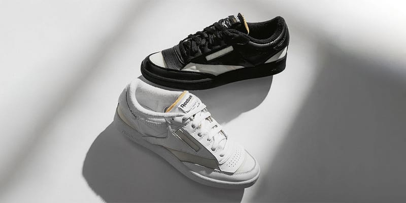 Reebok revenge plus hot sale black and white