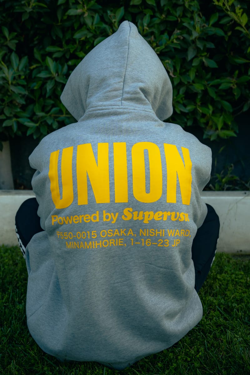 Chenille Caution Logo Mock Neck Knit | STUDIO SEVEN