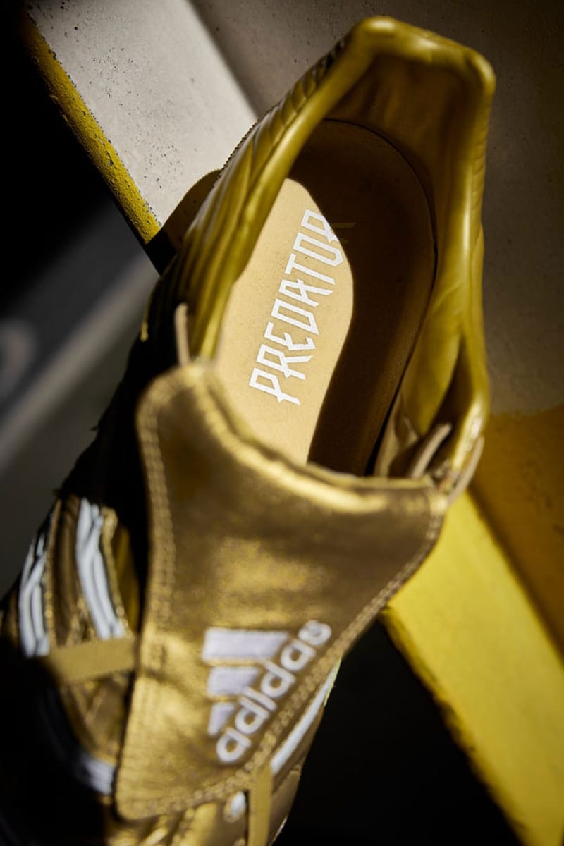 Golden adidas hot sale football boots