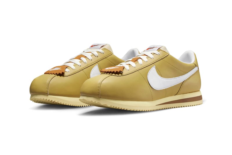 Nike black  and  gold cortez suede outlet trainers