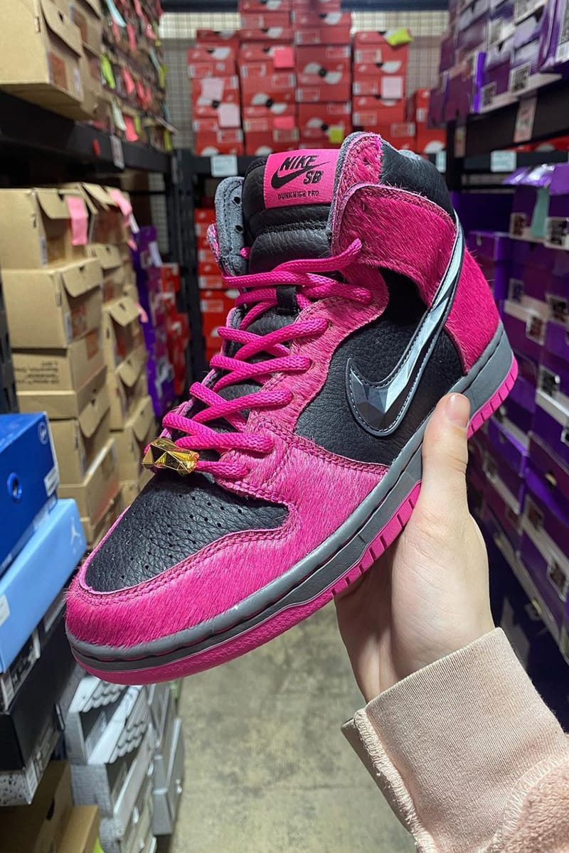 pink and black nike high tops