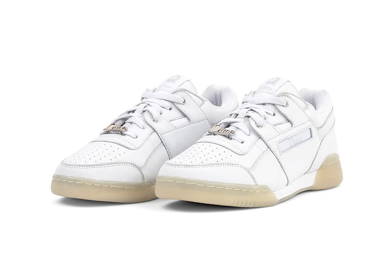 Reebok workout plus sale white trainers