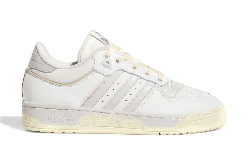 Adidas originals rivalry low trainers in triple on sale white