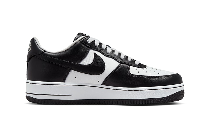 white air forces with black nike sign