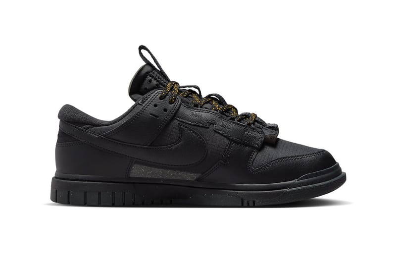 Nike black gold on sale shoes