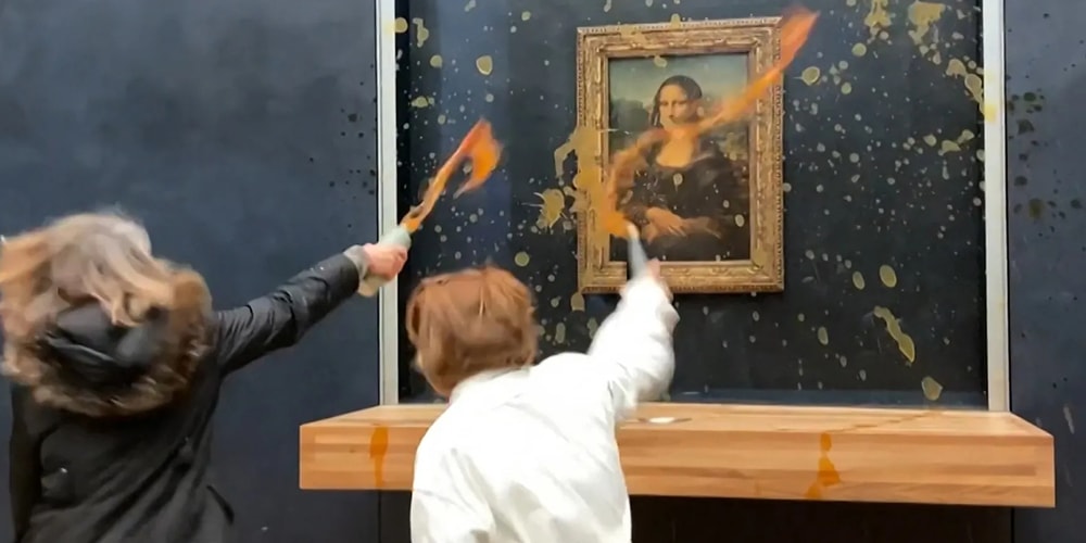 Протестующие облили супом картину Моны Лизы в Лувре