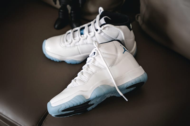 Blue and white low top 11s best sale