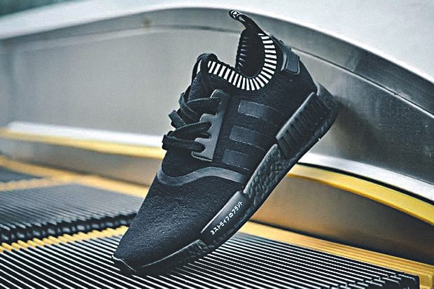 Black boost nmd hotsell