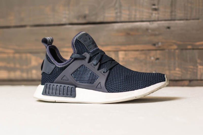 The Black Adidas Boost NMD Runner Looks Completely Badass The Black Adidas Boost NMD Runner Looks Completely Badass