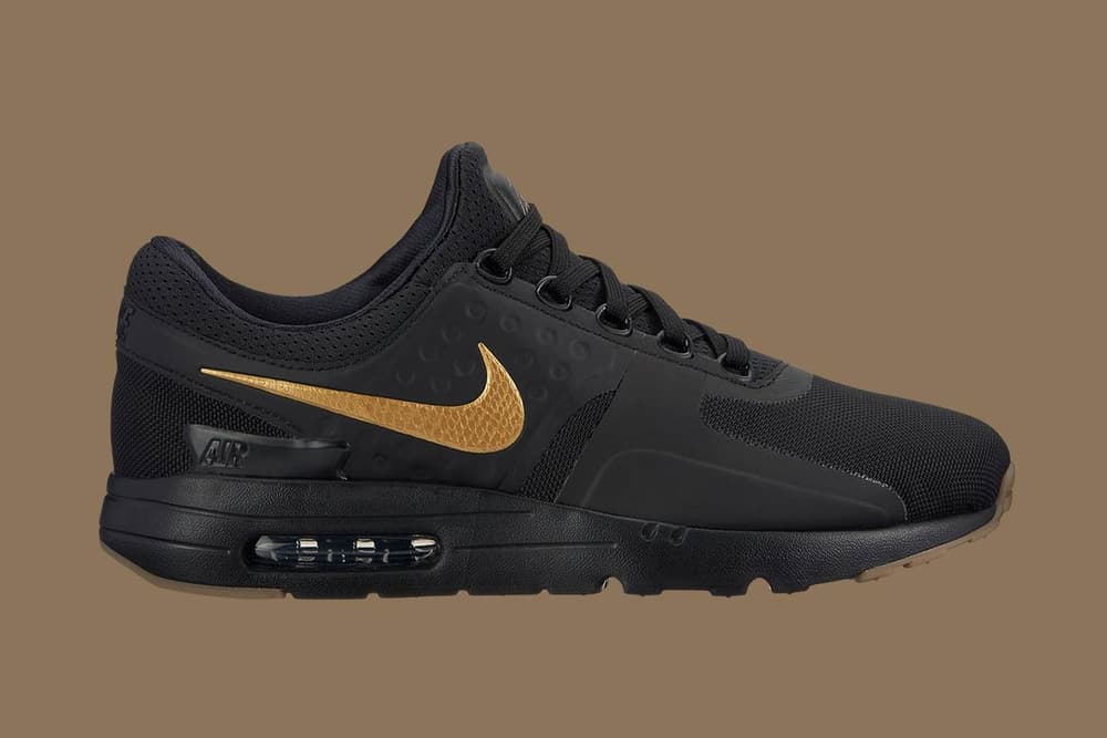 nike black gold tracksuit