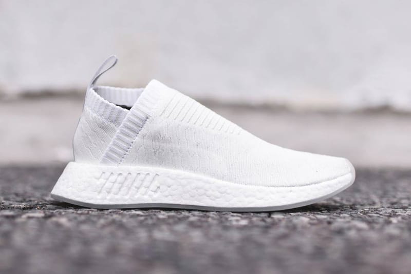 Nmd triple hot sale white primeknit