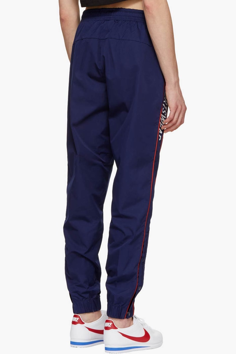Buy Nike's Snap Button Track Pants in Black Hypebae