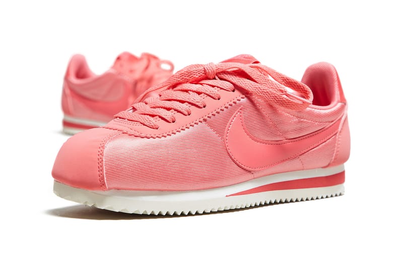 Pink nike cortez hot sale with gold swoosh