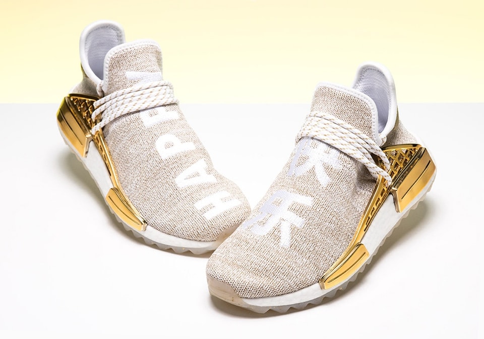 Pharrell x adidas Originals Hu NMD Trail in Gold | Hypebae