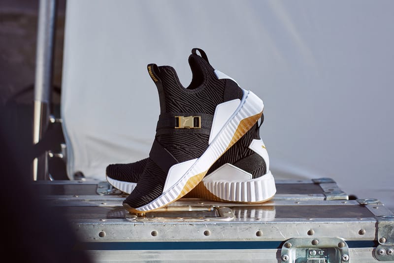 Puma defy mid core white and gold best sale