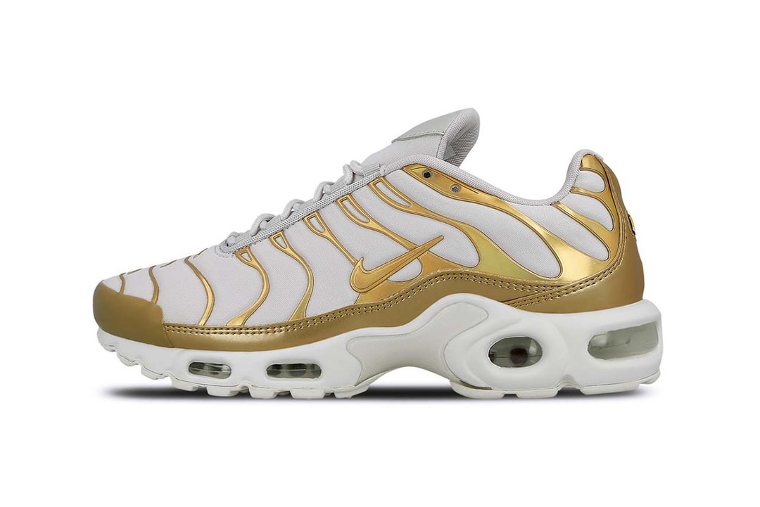 gold and white air max plus