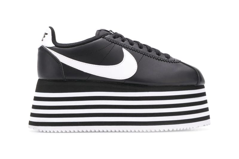 Nike black and hot sale white striped shoes