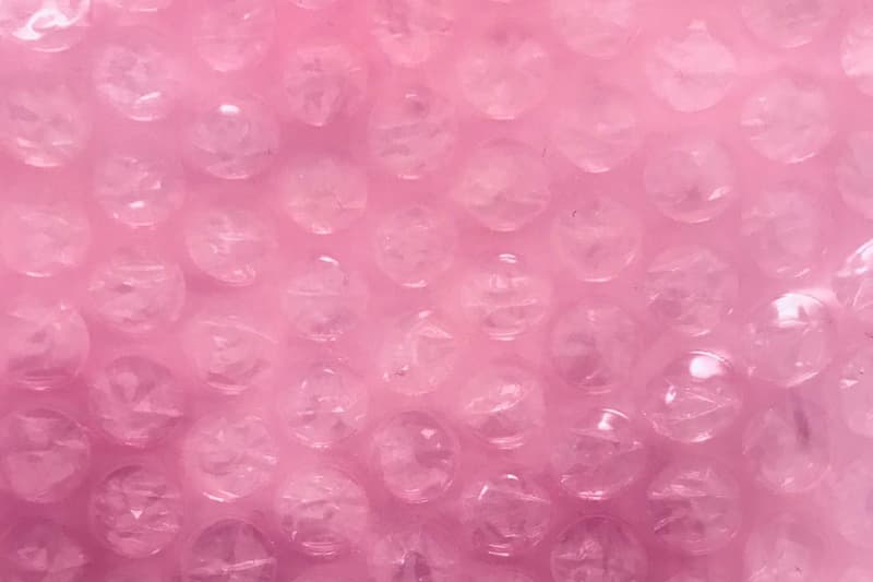 Glossier Pink Bubble Pouch Sustainable Packaging HYPEBAE