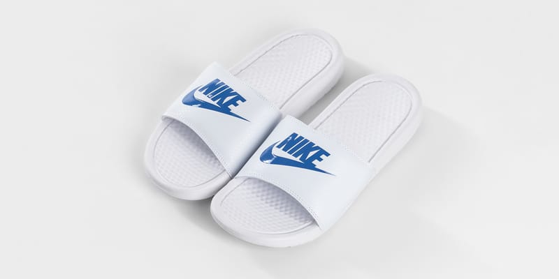 Light blue best sale nike slides