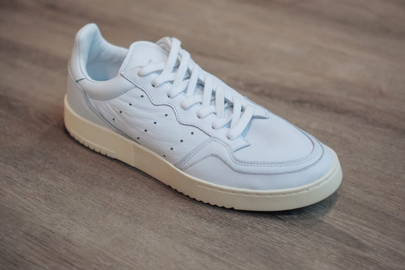 Adidas originals supercourt rx trainers in shop white x home of classics edition