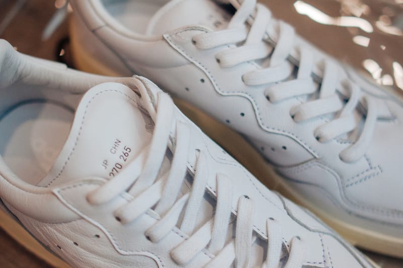 Adidas originals supercourt trainers in white x home 2024 of classics edition