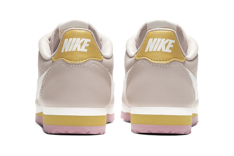 pink and white cortez shoes