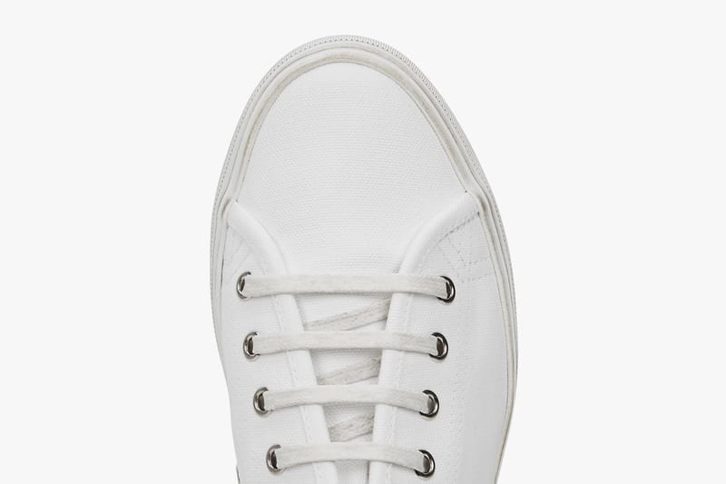 Saint Laurent Drops Clean White Canvas Sneakers | Hypebae Saint Laurent Drops Clean White Canvas Sneakers | Hypebae