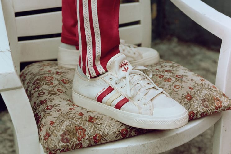 Adidas shoes best sale with red stripes