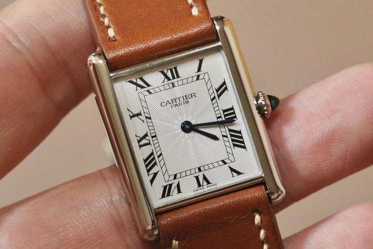 Least expensive cartier watch best sale