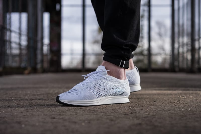 Nike flyknit racer triple white hotsell