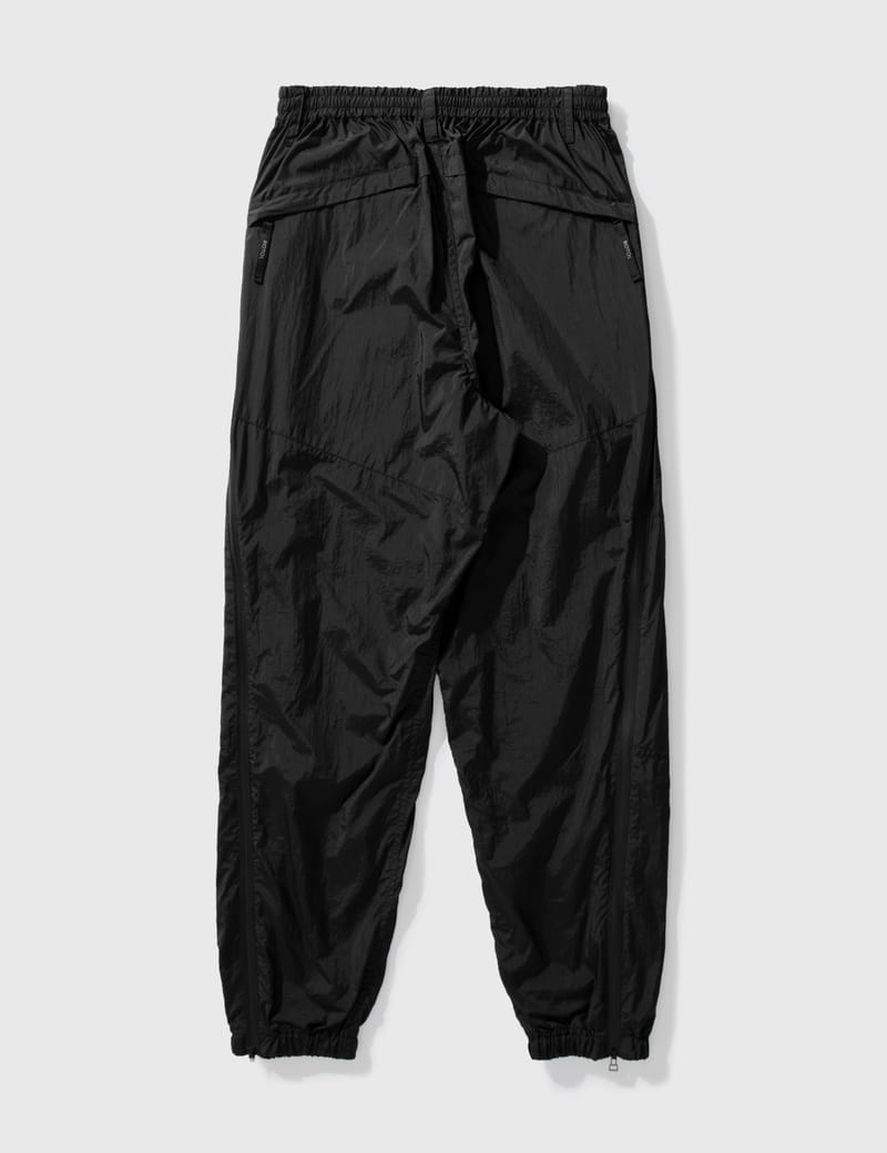 Rotol - TWIST TRACK PANTS | HBX - Globally Curated Fashion and