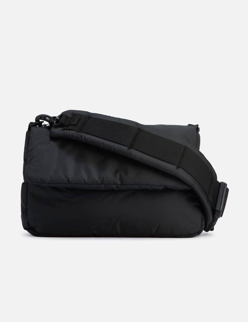 CLESSTE PADDED FLAP HOLIDAY BAG - Padded nylon bag with magnetic