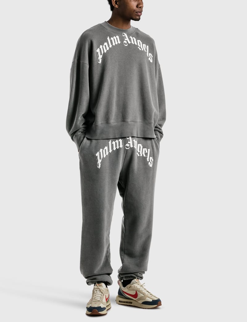 Palm Angels - Curved Logo Sweatpants | HBX - Globally