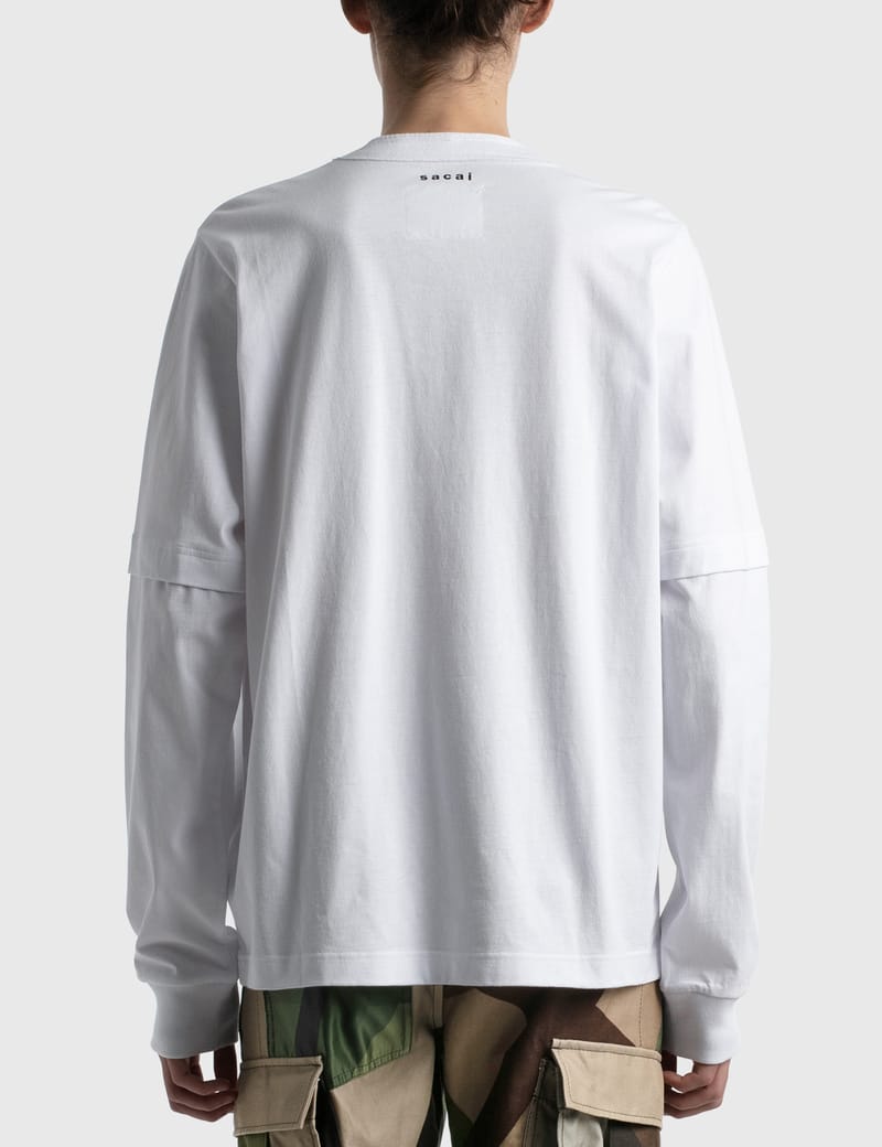 Sacai - KAWS Flock Print Long Sleeve T-shirt | HBX - HYPEBEAST 為