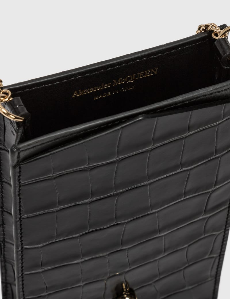 Alexander McQueen チェーン付き スカル フォンケース Alexander McQueen - チェーン付き スカル フォンケース | HBX