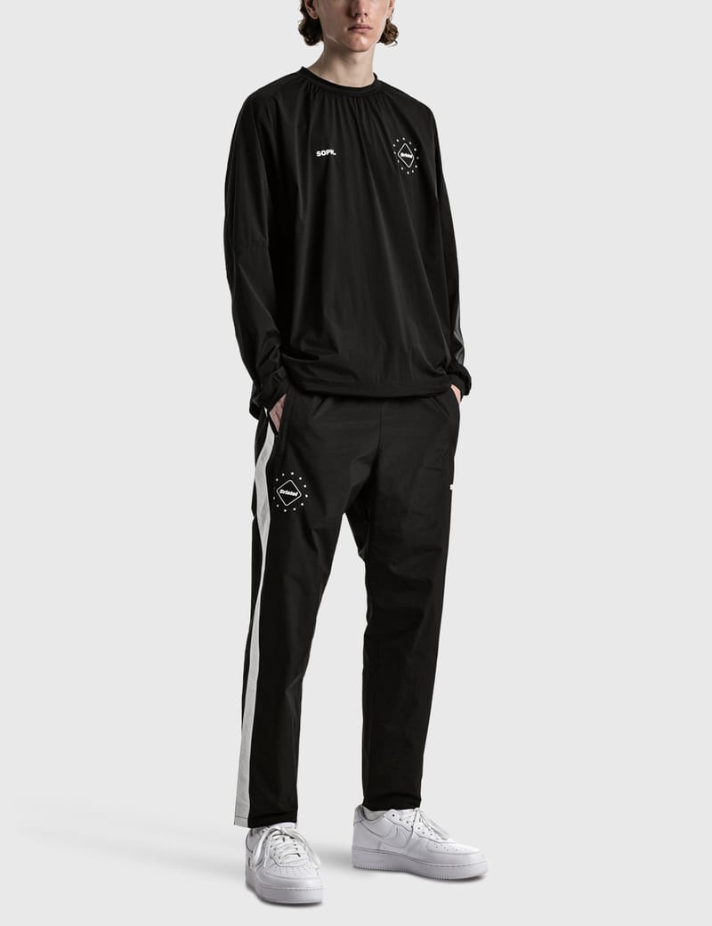 F.C. Real Bristol - SIDE LINE TRAINING PANTS | HBX - HYPEBEAST 為