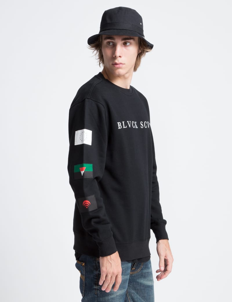 Black shop scale sweater