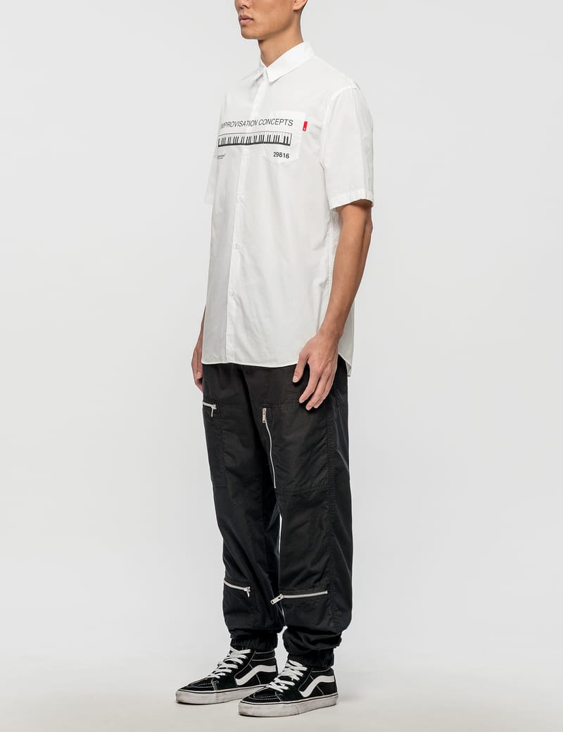 Undercover - Cargo Pants with Zip Detail | HBX - Globally Curated