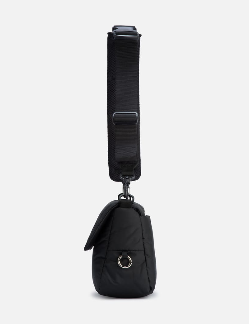 CLESSTE PADDED FLAP HOLIDAY BAG - Padded nylon bag with magnetic