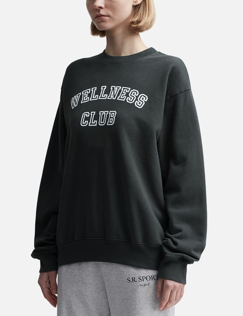 Sporty&Rich｜ (USA Wellness Club Crewneck - Soft Lavende Sporty & Rich Usa Wellness Club Crewneck in Soft Lavender | FWRD