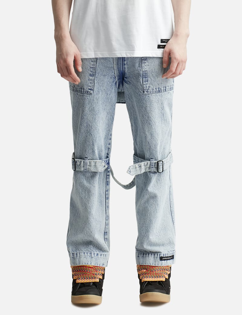 99%IS- - DENIM WASHED BONDAGE PANTS | HBX - Globally Curated