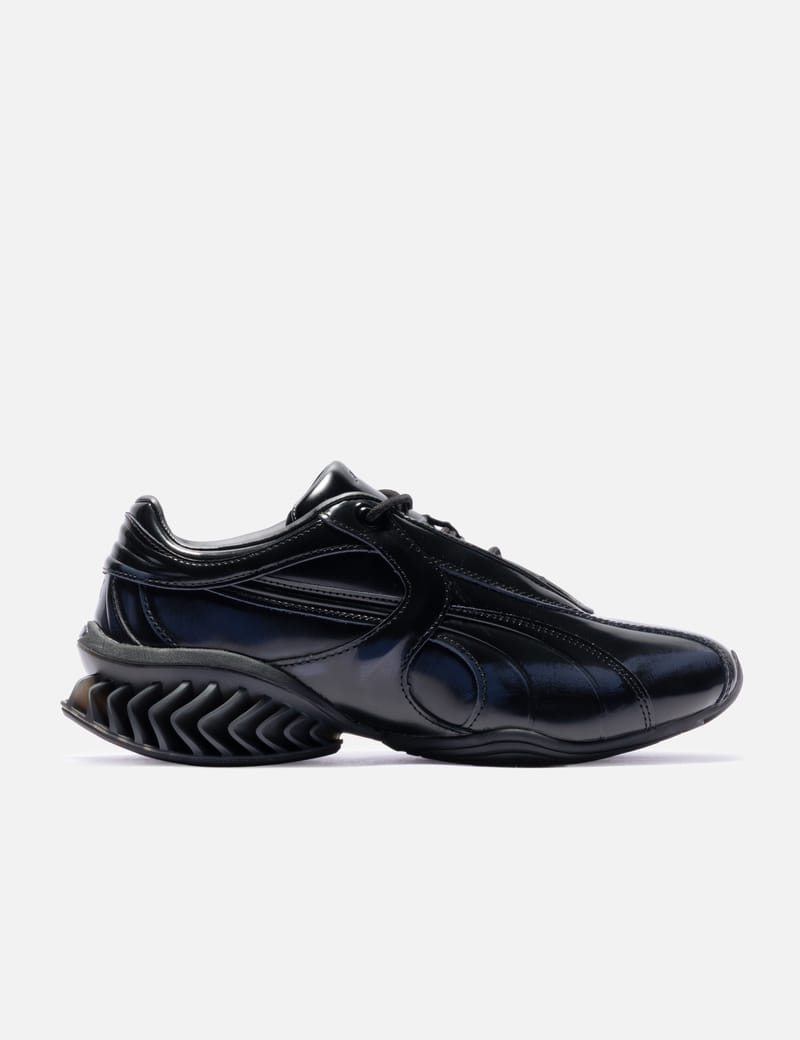 Puma PUMA X _J.L-A.L_ CELL GEO 1 - 亮面皮革與壓印標誌，結合緩震