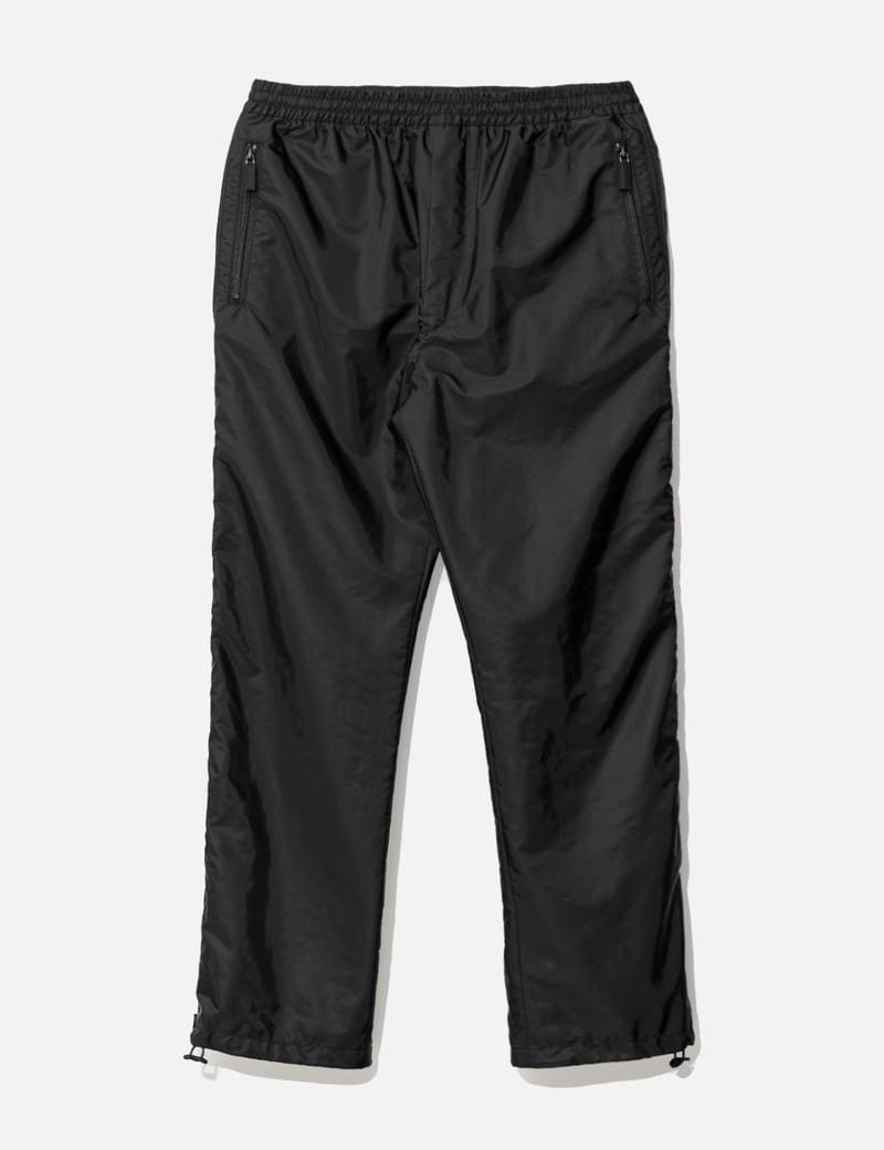 Prada logo 2025 zip pants