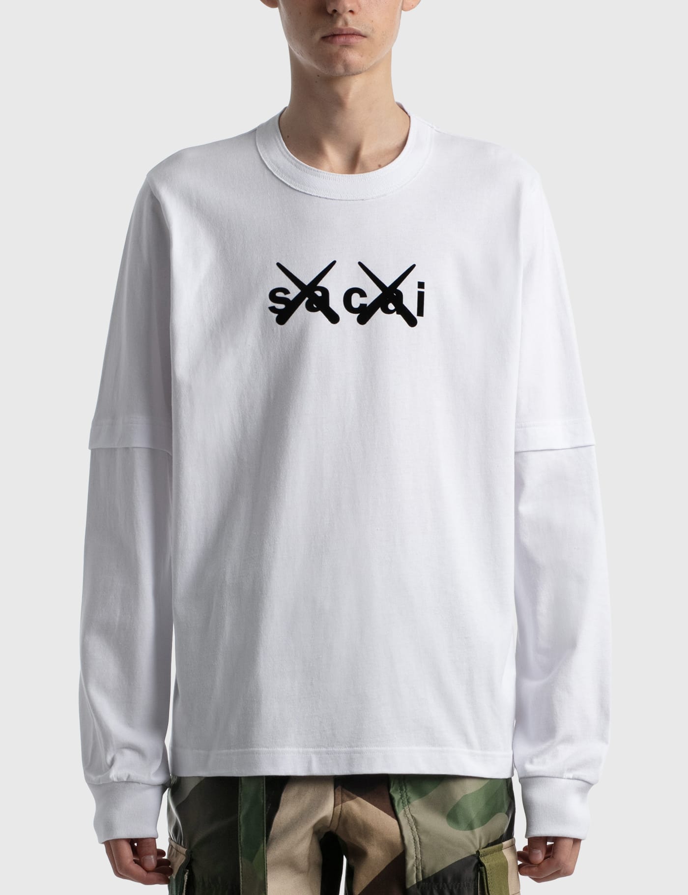 Sacai - KAWS Flock Print Long Sleeve T-shirt | HBX - Globally ...